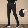 Pantalones deportivos negros Hombres Verano Transpirable Secado rápido Casual Cremallera Bolsillo Sweetpants Marca Moda suelta 's 210715