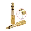 65mm hane till 35mm kvinnlig stereo -ljudadapter Jack Plug Connector Gold Plateda117970976