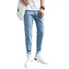 Calças jeans masculinas 9-ponto solta pés pequenos pés fino coreano moda meninos ins9 pontos versáteis