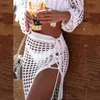 Verano mujer falda de playa moda punto recorte alto flecos blusa dividida blanco ahueca hacia fuera borlas vendaje vestidos traje de baño de mujer