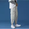 Herrbyxor m￤n m￤n jogger r 2022 herrar last overaller fickor hip hop joggers svettbyxor manliga svarta mode 5xl