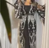 Evening dress Yousef aljasmi Zuhair murad Black lace Appliques Silver Crystals Long sleeve Cape Kim kardashian Kylie jenner