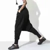 [EAM]春ファッションブラックソリッドドローストリングポケット因果ルースビッグサイズ女性ハイウエストハーレムパンツRA224 211124
