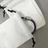 Pulseiras de grife de luxo Joias Pulseiras clássicas Bolsas com clipe de gravata Chaveiro Cadeia de cordão Saco de pó 244v