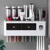 Portaspazzolino magnetico multifunzione con tazze Accessori da bagno Set Dispenser automatico di dentifricio Spremiagrumi 210322