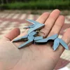 Pocket Multitools Plier 1PC في الهواء الطلق ميني ميني قابلة للطي Muilti-Functional Plier Clamp Chip-keyking Camping Tool310y