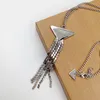 Collar colgante del triángulo de las mujeres con la letra del sello collares de borla para el partido de regalos Accesorios de joyería de alta calidad