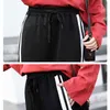 Kvinnor joggare sweatpants casual wide ben byxor stripe hip hop byxor streetwear röd svart hög midja chic 211124