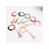 Wholesale foreign trade food grade silicone beads wrist keychain alloy cap PU leather tassel keychain female multicolor optional