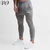 Jogger jesień casual streetwear bawełniane spodnie mięśni moda męska spodnie sportowe siłownie trening bodybuilding męska odzież G0104