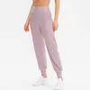 Lösa sportbyxor Kvinnors körande Yoga Joggers Pocket Fritid Snabbtorkande Fitness Leggings Workout Gym Kläder