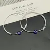 2 stks plat blauw boze oog vrouwen mannen handgemaakte lucky armband meisje verstelbare zwarte rode string armbanden femme mode-sieraden