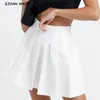 Sommer Vintage geraffte fallen gelassene plissierte Minirock Preppy-Stil hohe Taille A-Linie kurze Röcke schwarz weiße Farbe seitlicher Reißverschluss 210429