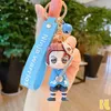 크리스마스 선물 Keychains 애니메이션 악마 슬레이어 Kimetsu no yiiba keychain 양면 열쇠 고리 자동차 가방 펜던트 그림 열쇠 고리