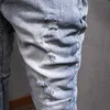Ly Designer Fashion Men Jeans Retro Light Blue Destroyed Ripped Denim Pencil Pants Streetwear Hip Hop Pantalones delgados elásticos