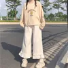 Japonês Kawaii Macio Menina Mulheres Calças Doce Base Ruffled Wild Cintura Loose Calças Loose Elastic Casual Estudante Sólido Pant 210915