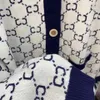 Outono 2021 Estilista de moda high-end malhas femininas usam cashmere retrô lã de luxo casual versátil branco tamanho grande cardigã macio confortável estilo botão