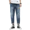 Mens Jeans Ripped Baggy Spring Sommar Hollow Out Loose Fit Distressed Byxor Män Brett Benbyxor Man Hip Hop Jeans Oversize 42 x0621