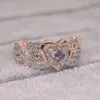 Anello da sposa in argento con anelli a fascia da donna. Anello con zirconi CZ a cuore abbagliante