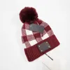 Winter Knitted Hats Luxurys Letter Pompon Beanies Plaid Fur Pom Skull Caps Boonet Women Girls L Outdoor Warm Crochet Hat Chunky Knit Cap Adhesive Label TikTok