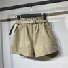 Kvinnors shorts kvinnors mode hög midja flickor a-line eleganta läderbottnar bredbenta höstvinterkvinnor skickar bälte