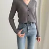Fashion Solid Knitted V-Neck Thin Spring Hollow Out Chic High Waist Office Lady Women Gentle Slim Sweaters 210525