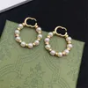 Nieuwste ontwerper Pearl Circle Earrings Charm Women Dubbele brief Oordoppermeisje Hangstudies voor feestdatumcadeau