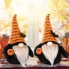 Fournitures de fête classiques décoration d'halloween Gnome sans visage tenant citrouille Figurines de poupée en peluche à la main accessoires de vacances ornements