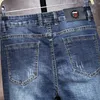 Модный бренд мода мужские вышитые стройные джинсы корейский стрейч вскользь прямые брюки мужские деловые штаны 210531