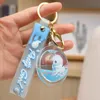 Porte-clés créatif mignon de luxe en acrylique avec poupée à huile, pendentif rond pour sac de femme, porte-clés entier