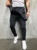 Męskie spodnie w trudnej sytuacji jeansowej stolarki BIB Jumpsuits moto dżinsy spodnie zima dla mężczyzn punk streetwear drak22