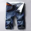 Män denim shorts sommarstil tunn sektion elastisk kraft smal passform kort jeans manliga märke kläder svart blå 210322