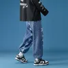 Mäns Jeans Stjärnor Skriv ut Riktigt ben för Mens Fashion Trends Punk Style Kläder Tonåringar Oversized Baggy Denim Pants Harajuku Streetwear
