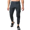 Nowe Joggers Kombinezony Mężczyźni Casual Skinny Spodnie Multi-Pocket Spodnie Męskie Spodnie Track Gym Fitness Training Bodybuilding Sport Spodnie G0104