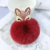 Portachiavi con pompon a forma di palla di pelo di coniglio Adorabile testa di animale Portachiavi con strass di perle per portachiavi con ciondolo per auto da donna