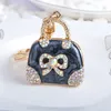 10pieces / Lot Exquisite Charm Fashion Keychain Kreativ handväska formad design Keychain Bow Crystal Purse Väska Keyring Nyckel Kedja Kvinna gåva