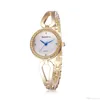 Femme mode robe montres creux Bracelet bracelet design bleu aiguille des heures Style rétro montre à Quartz bon cadeau coquille cadran montre-bracelet strass