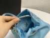 Thick silver ring handle mini bag high-quality nylon fabric Unisex style bucket handbag fashion classic Triangle emblem Design cute pouch