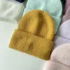 Basker vinterhuvud huva angora h￥r stickad hatt med ￶ronflikar kvinnors varma fasta f￤rg ull cap pullover skallies m￶ssor