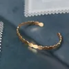 Högkvalitet rostfritt stål smycken för kvinnor polerade 18k guldpläterade öppna armband flickor fantastiska läckra ringar bangle2868