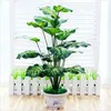 Dekorativa blommor kransar 65 cm 18 gaffel tropisk monstera stort konstgjorda träd bonsai plastväxter krukväxter falska palmblad för5945652