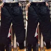 Winter Warme Sweatpants Vrouwen Zwart Hoge Taille Down Katoen Broek Streetwear Dikke Baggy Pant Plus Size Side Rits Stretch Jogger Y211115