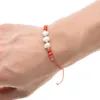 Braccialetti con ciondoli 12 pezzi / set Braccialetti con ciondoli in rilievo di cristallo di perle per le donne Gioielli con cinturino in corda regolabile Regalo di compleanno per bambini