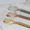 Brand Classic Snake Bone Chain rostfritt stål Elektropläterad 18K Guldarmband Designer Fashion Personlighet Charm Armband för kvinnliga män