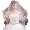 Velo da sposa corto con applicazioni di fiori dolci romantici sposati da donna