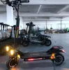 Lo scooter elettrico fuoristrada per adulti con motore 2X1200W di vendita diretta in fabbrica supporta la luce LED gonfiabile pieghevole da 10 pollici