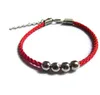 Män och kvinnor lyckligt armband i år älskare par handvävda fyra pärlor röda rep armband