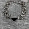 Marke Modeschmuck Schwarzes Dreieck Dicke Kette Rosa Anhänger Glück Steam Punk Design Hip-Hop Choker Männer Unisexb5BU