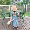 Odzież dziecięca Hurtownie Summer Koreański Backless Dress Dzieci Dziewczyna Kwiat Powrót Hollow-out Retro Bubble EURIOŚĆ I Styl amerykański