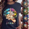 女性の唇パターンティーTシャツファッショントレンドカジュアルラウンドネック半袖トップスデザイナー夏の女性の黙じれジェスチャー印刷Tシャツ